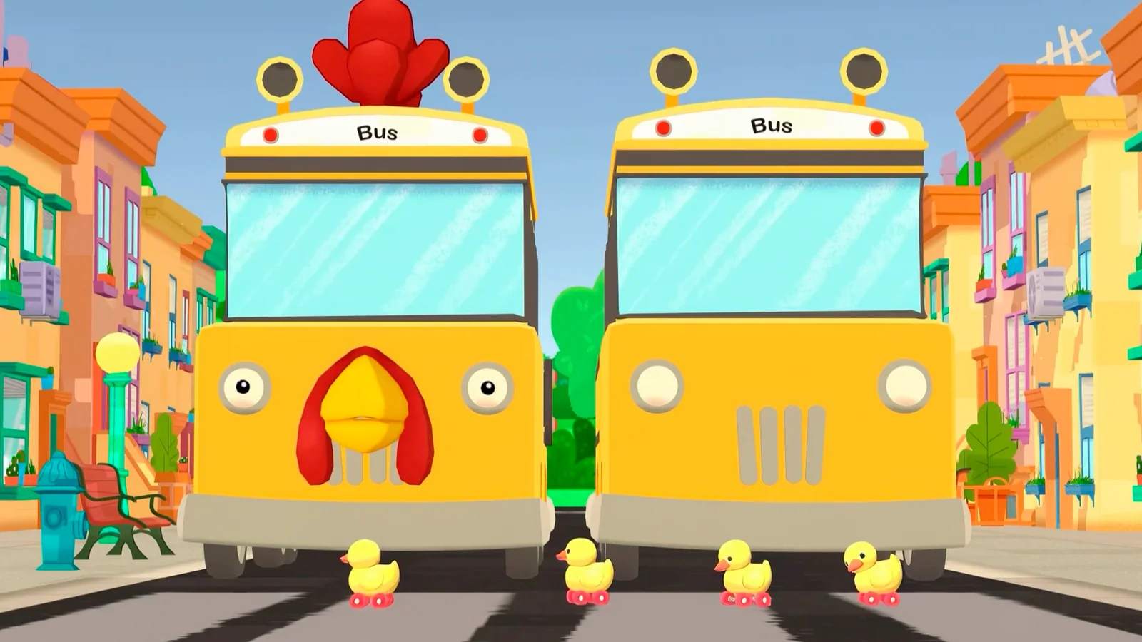 Two yellow buses and four rubber ducks in a Sesame Street: Friends & Fun activity.